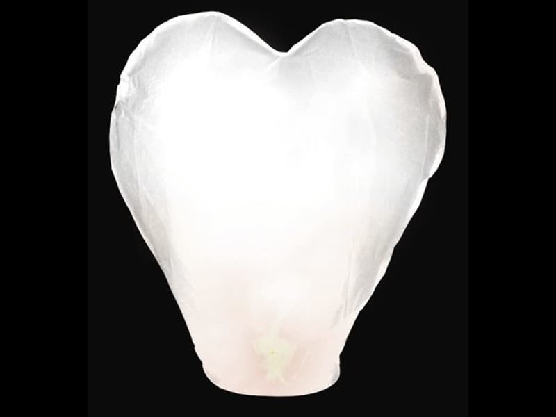 White sky lanterns, heart shaped for weddings,  parties and other festivities, fire resistant and biodegradable paper, mounted and strong fuel cell,  ready for use. Open, light it and let if fly!
