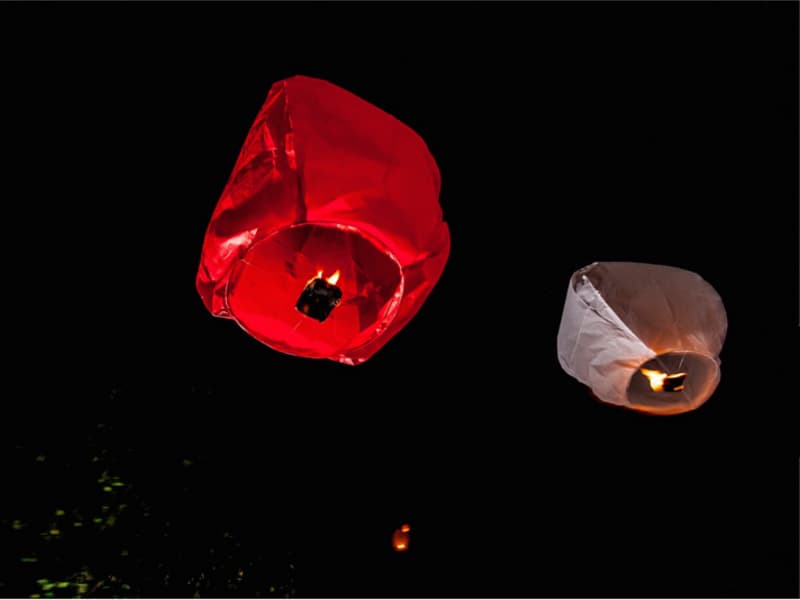 The red sky lantern that comes with the 30 white ones is for the bride and the groom.