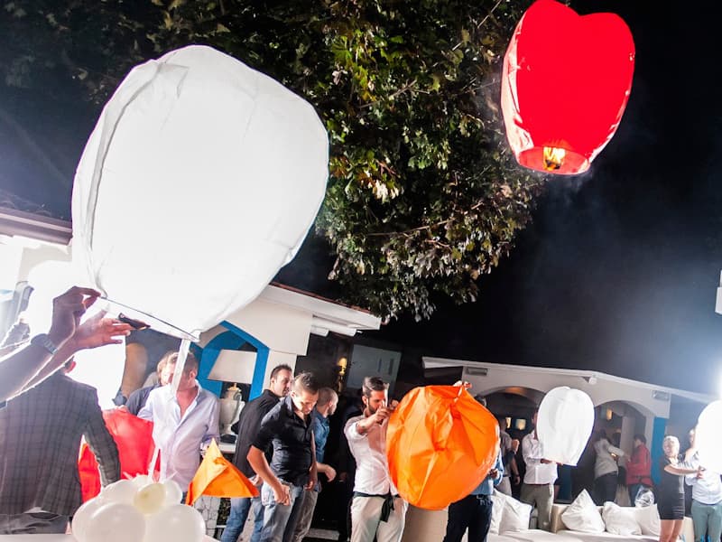 Wedding with fireworks or lanterns? Sky lanterns are a lot cheaper than fire works, the additional advantage is that all guests are involved in launching them, with fireworks they will only watch what happens, these wish balloons for sure a more fun!